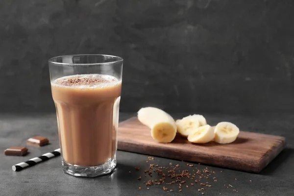 Glass with chocolate protein shake — Stock Photo, Image