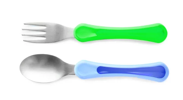 Colorful eating utensils for baby on white background — Stock Photo, Image