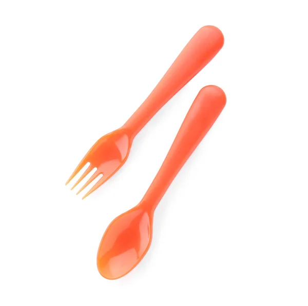 Utensílios alimentares coloridos para bebê no fundo branco — Fotografia de Stock