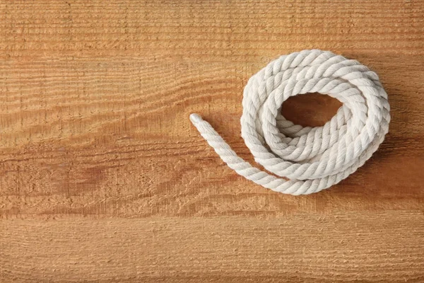 Hemp rope on wooden background — Stock Photo, Image