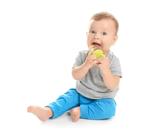 Adorable little baby with nibbler on white background — Stock Photo, Image