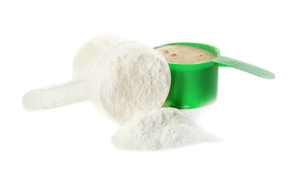 Protein powder and scoops on white background — Stock Photo, Image