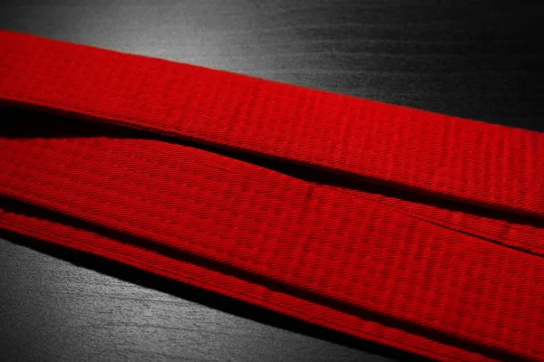 Red karate belt — Stock Photo, Image