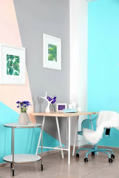 Lilac accent in modern interior. Comfortable workplace at home