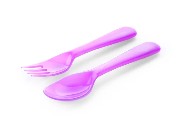 Colorful eating utensils for baby on white background — Stock Photo, Image
