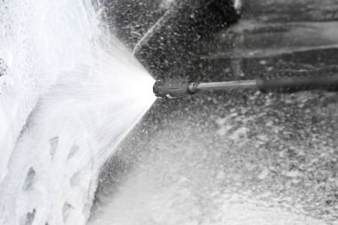 Yüksek basınçlı su, closeup ile araba Temizleme