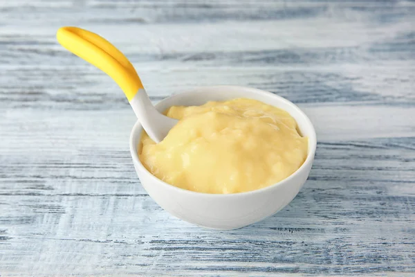 Bowl with porridge for baby — Stock Photo, Image