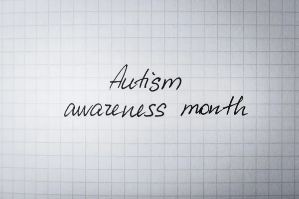 Text AUTISM AWARENESS DAY written in notebook, close up — Stock Photo, Image