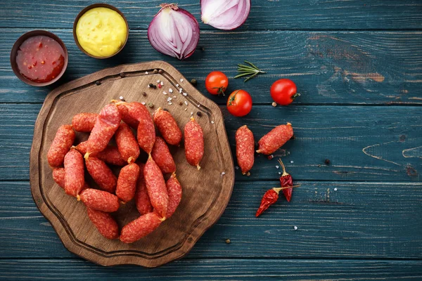 Composition with delicious small sausages — Stock Photo, Image