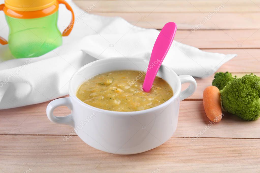 Bowl with creamy baby vegetable soup 