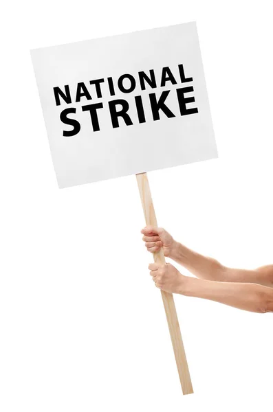 Homem segurando tabuleta com texto NATIONAL STRIKE no fundo branco — Fotografia de Stock