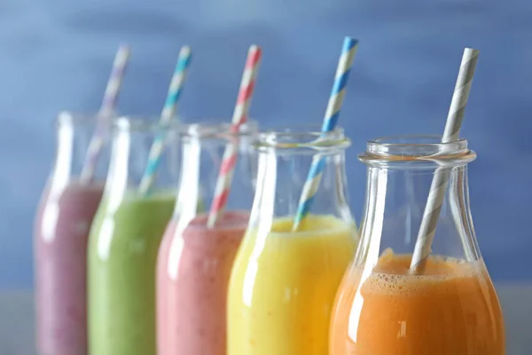 Bottles with yummy smoothie — Stock Photo, Image