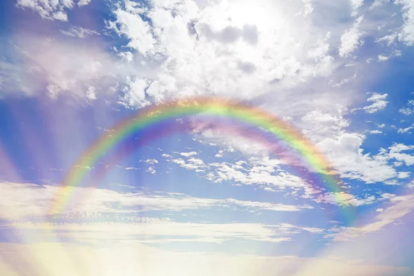 clouds and rainbow in sky