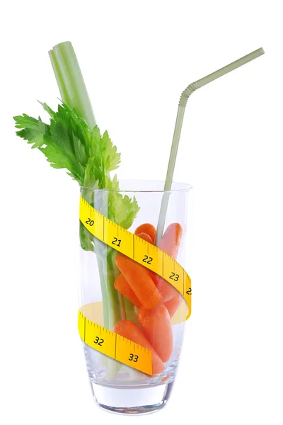 Measuring tape and ingredients in glass for juice — Stock Photo, Image
