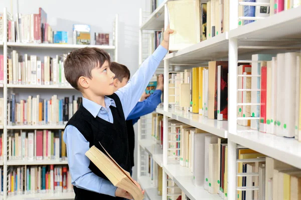 Little boys at school library — Stock Photo, Image