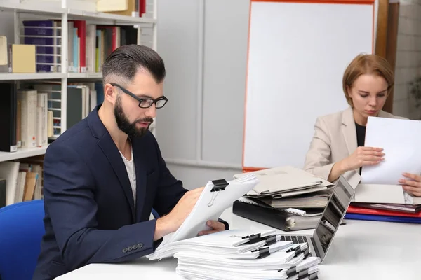 People working with documents