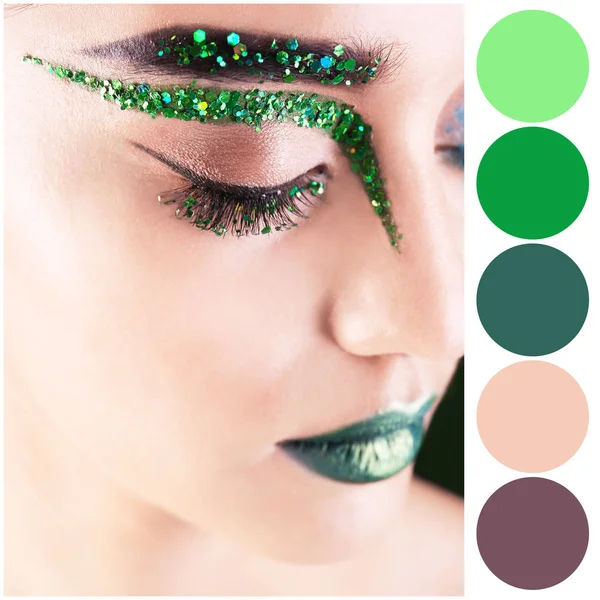 Tavolozza dei colori e bella donna con fantasia trucco verde, primo piano — Foto Stock