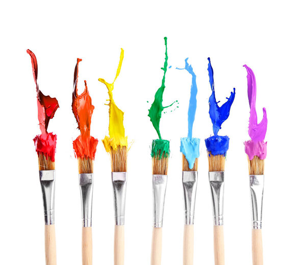 Brushes with splashes of paints 