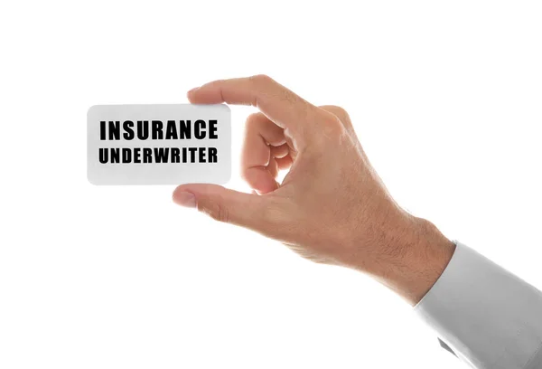 Podnikatel, drží vizitka pojišťovacího agenta na bílém pozadí — Stock fotografie