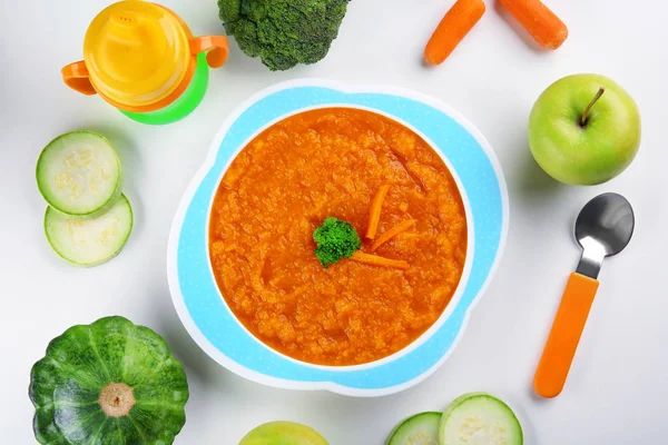 Talerz zupy marchew kremowy dziecko — Zdjęcie stockowe