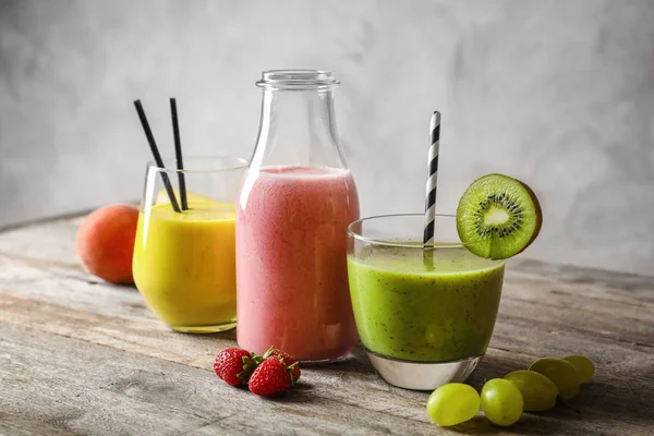 Composition with smoothie on wooden table — Stock Photo, Image