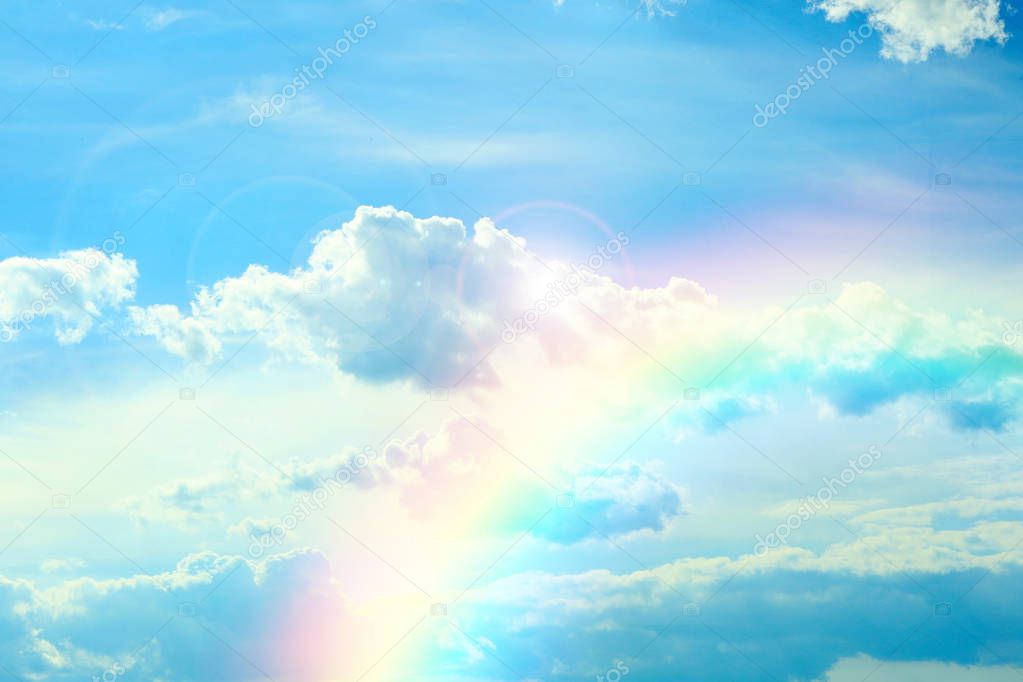 clouds and rainbow in sky