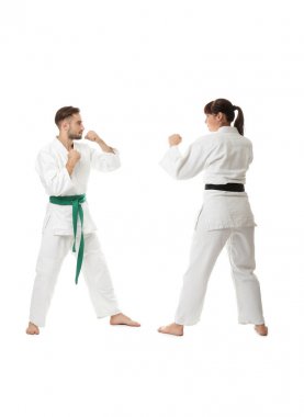 man and woman practicing karate   clipart