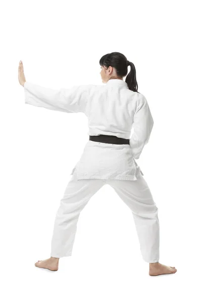 Mujer joven practicando karate — Foto de Stock