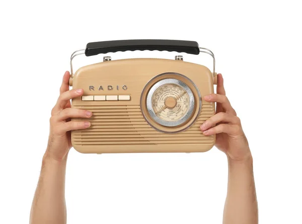 Jovem segurando rádio retro no fundo branco — Fotografia de Stock