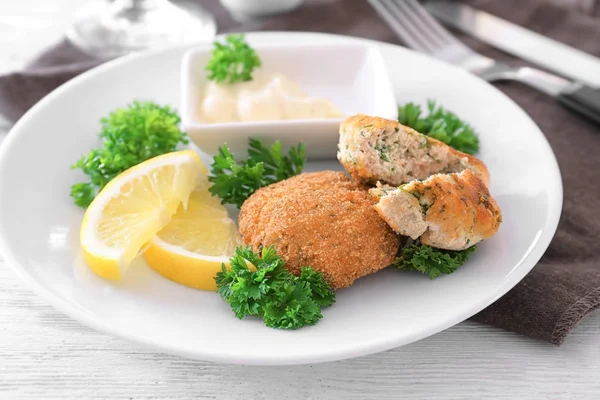 Plate with delicious salmon patties on table — Stock Photo, Image