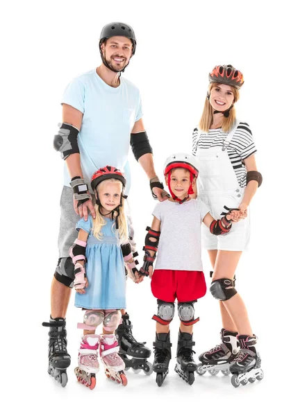 Pareja con niños en patines sobre fondo blanco —  Fotos de Stock