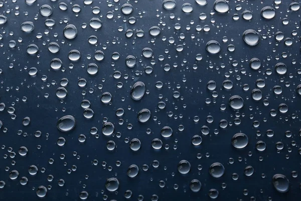 Water drops on glass, closeup — Stock Photo, Image