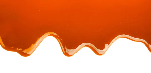 Yummy sosem karmelowym na białym tle — Zdjęcie stockowe
