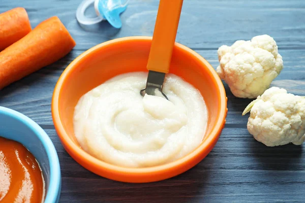 Bowl with baby food — Stock Photo, Image