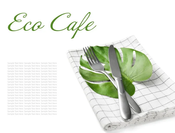 Cutlery and leaf with text ECO CAFE on white background — Stock Photo, Image