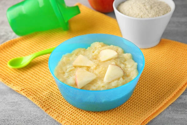 Bowl with porridge for baby — Stock Photo, Image