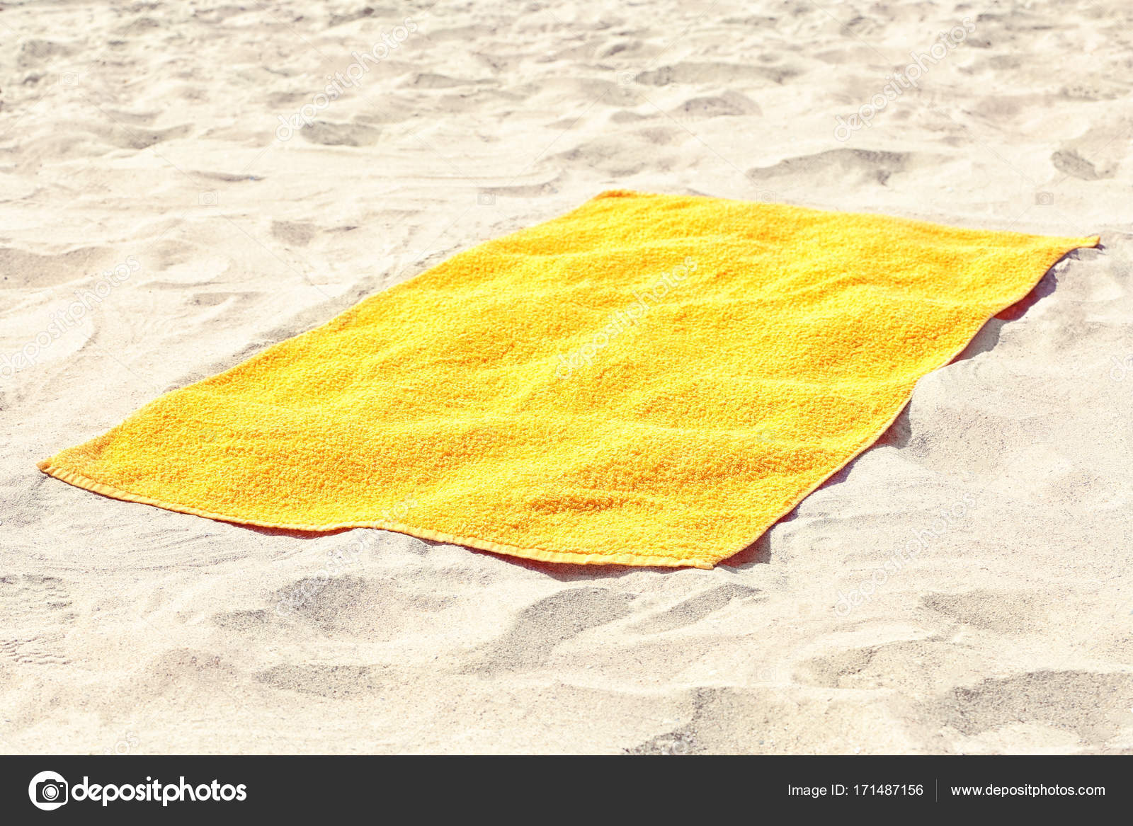beach towel on sand