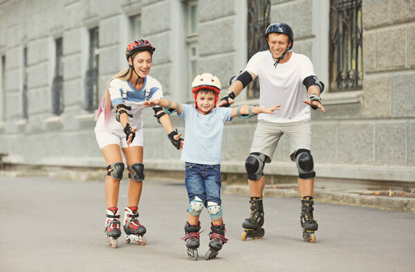 Family on roller skates outdoors