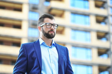 Handsome confident businessman