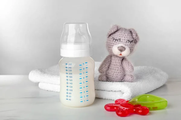 feeding bottle of baby milk formula