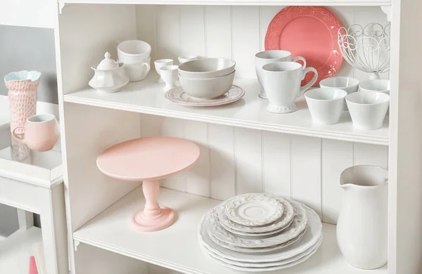 storage stand with dishware