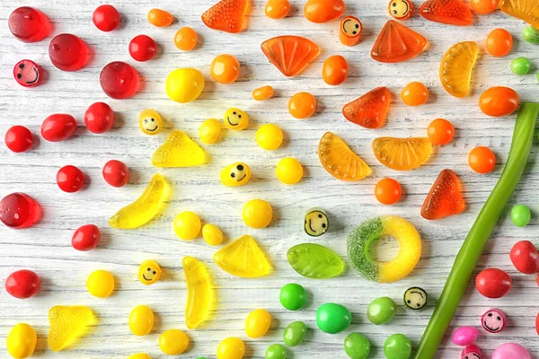 Colorful candies on light background — Stock Photo, Image