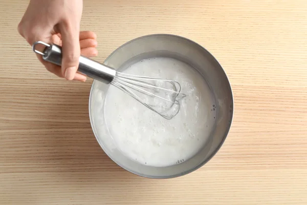 Woman making pudding — Stock Photo, Image