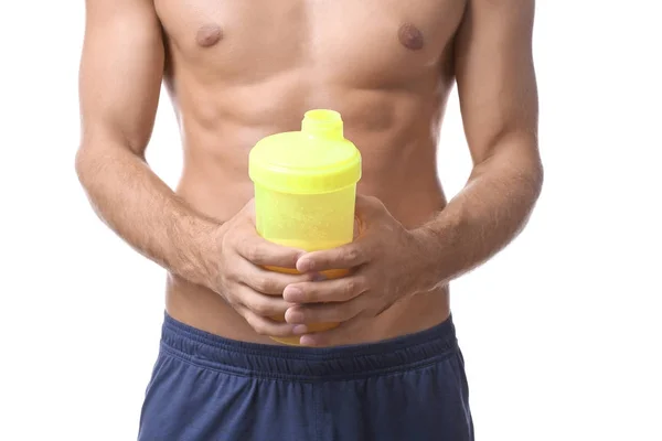 Jeune homme tenant bouteille avec shake protéiné — Photo