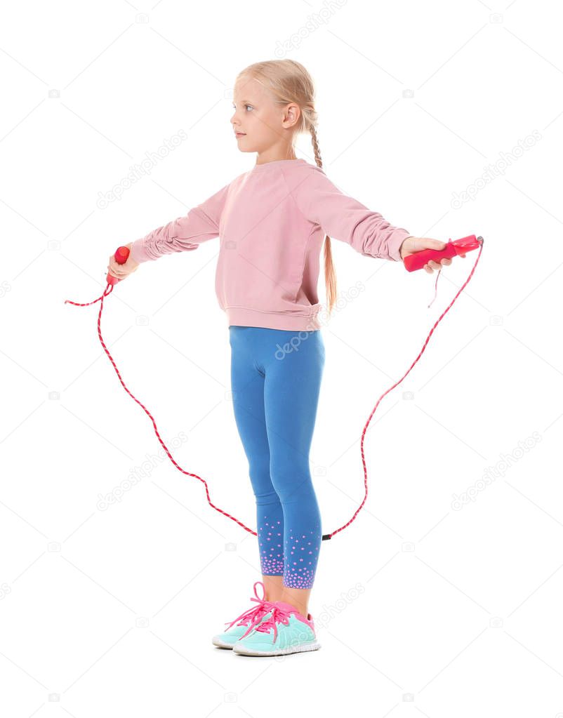 Adorable girl skipping rope, isolated on white