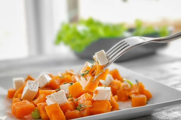 Fork with delicious sliced sweet potato — Stock Photo, Image