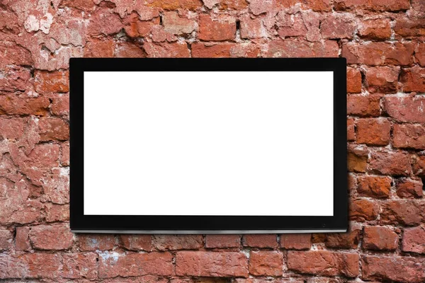 Moderní televizní obrazovkou na cihlovou zeď na pozadí — Stock fotografie