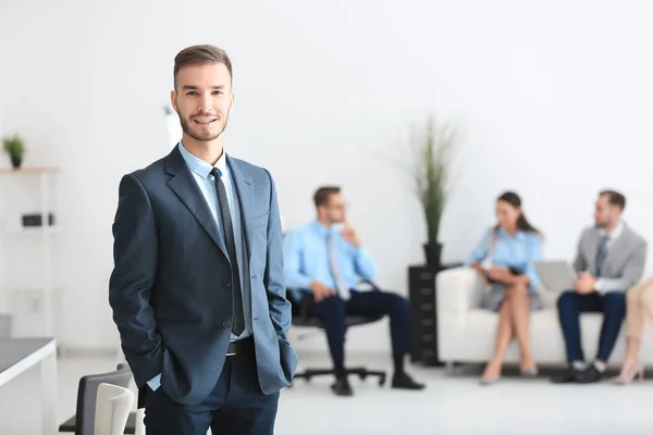 Young handsome man in office — Stock Photo, Image