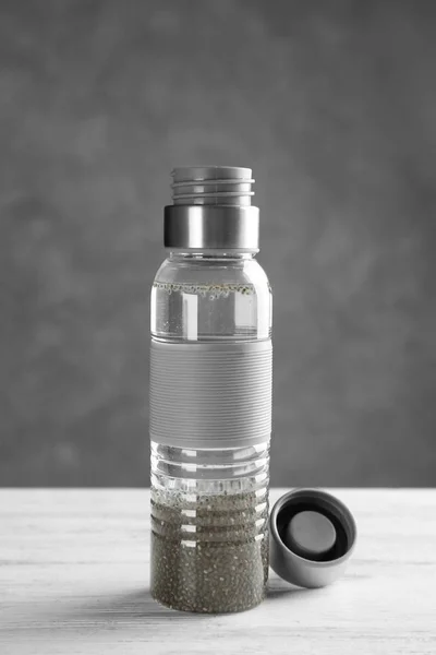 Bottle of water with chia seeds — Stock Photo, Image