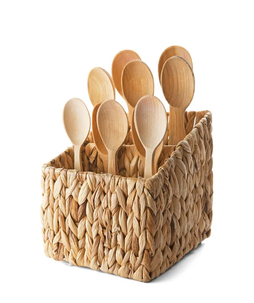Wooden spoons in wicker basket — Stock Photo, Image